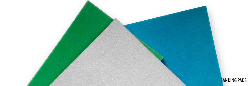 Foam sanding pads with various grits for sanding furniture